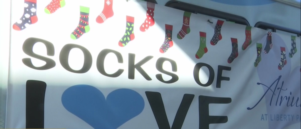 Cape Coral assisted living facility donates socks to those in need