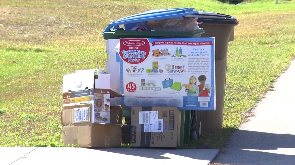 Police, Waste Pro team up to keep homes safe after gift boxes hit the curb