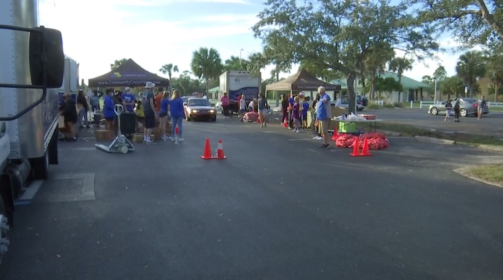 Community Cooperative serves families food items for holiday feasts in Lehigh Acres