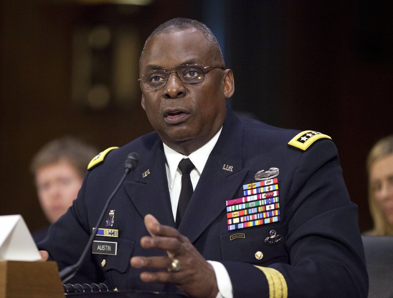 Biden to nominate retired Army general Lloyd Austin as defense secretary, the first Black man to hold the role