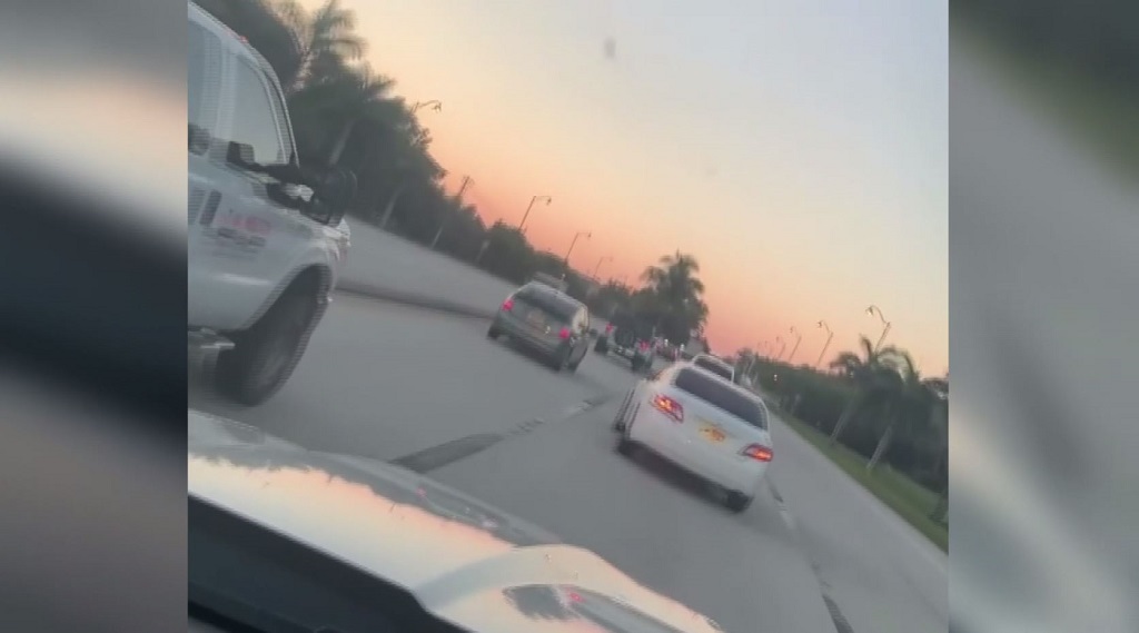 Man records reckless driver swerving on roadway, hitting other vehicle