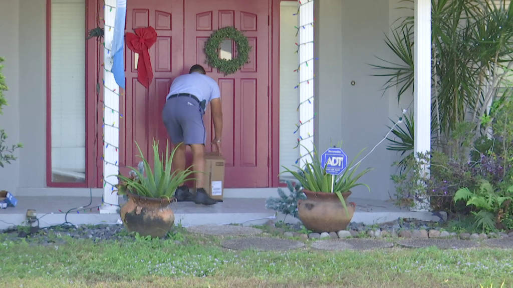 Postal carriers working overtime to meet holiday demand