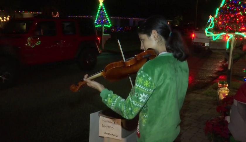 sidney cramer, 16, plays her violin