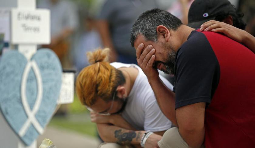 Nearly 20 police officers stood in a hallway outside of the classrooms during this week’s attack on a Texas elementary school for more than 45 minutes before agents used a master key to open a door and confront a gunman, authorities said Friday.