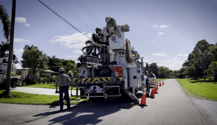 FPL truck fixing utility poles.