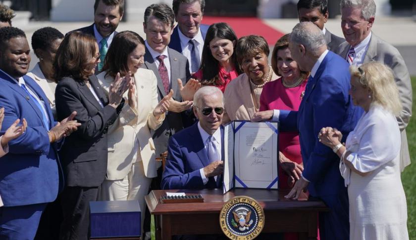 President Biden signed into law a bill providing more than $200 billion to boost domestic production of semiconductor computer chips