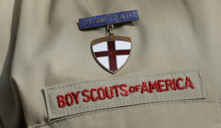 FILE - A close up of a Boy Scout uniform is photographed on Feb. 4, 2013, in Irving, Texas. (AP Photo/Tony Gutierrez, File)