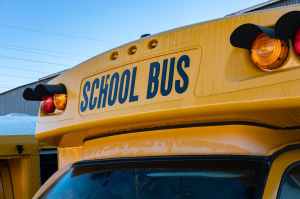 yellow school bus under blue sky