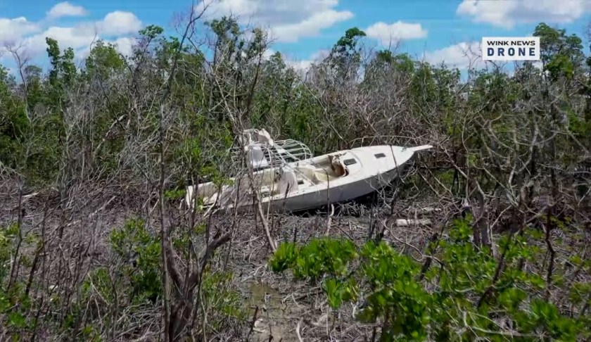 helicopters remove boat