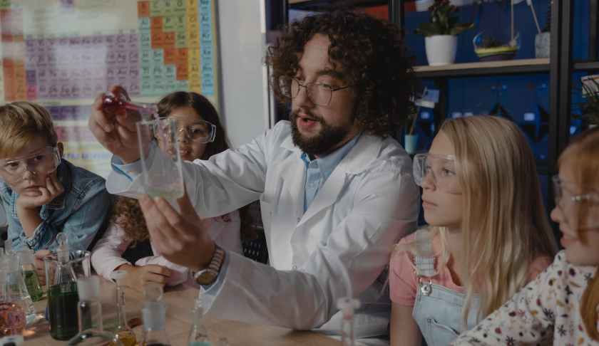 teacher discussing chemicals in a class