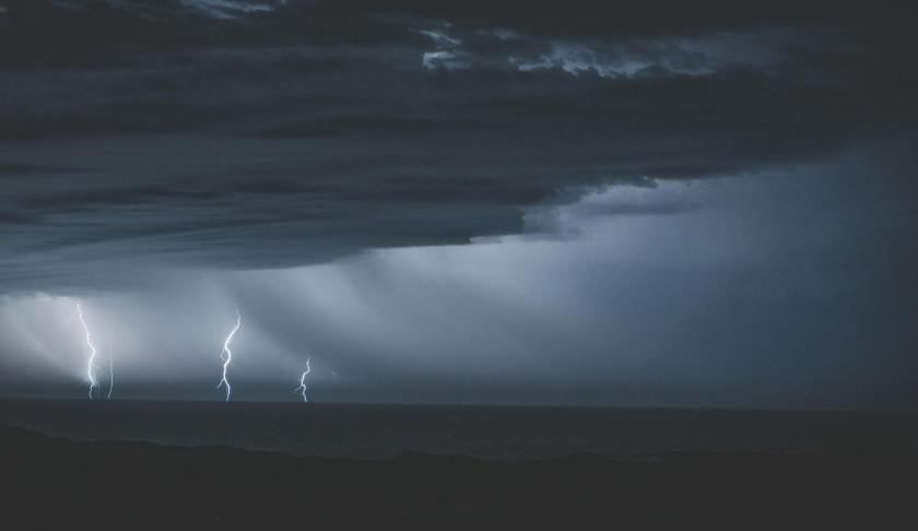 thunderstorm with glimmering lightnings over ocean