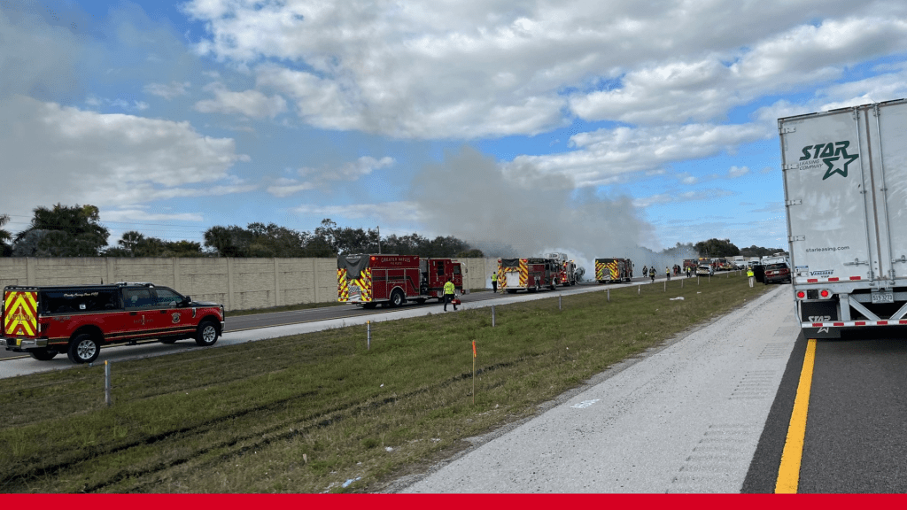 First responders on the scene of the plane crash on I-75. CREDIT: WINK News.