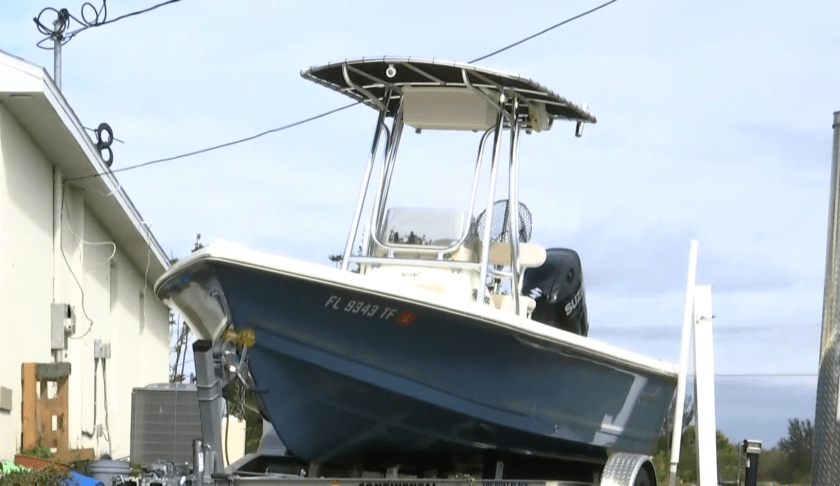 Boat parked in yard.