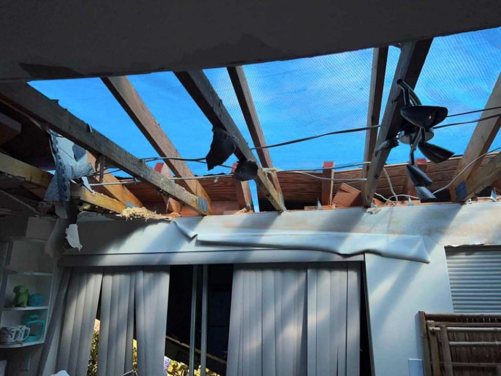 Ford's kitchen ceiling after Hurricane Ian, waiting for insurer to fix home