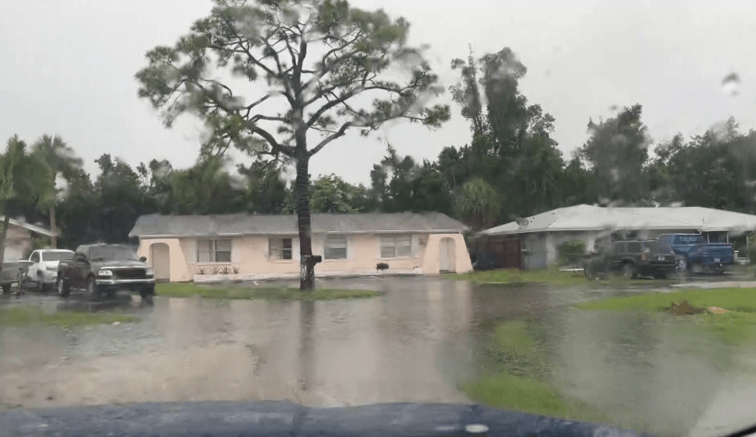 Fort Myers flooding around houses. CREDIT: WINK News