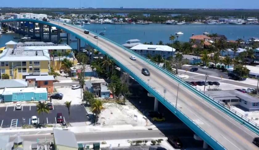 Cars driving over Fort Myers Beach