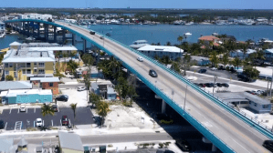 Cars driving over Fort Myers Beach