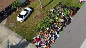 Things have gotten so bad in one Cape Coral front yard that it looks like a junkyard, and neighbor Tom Ashton is fed up with the trash.