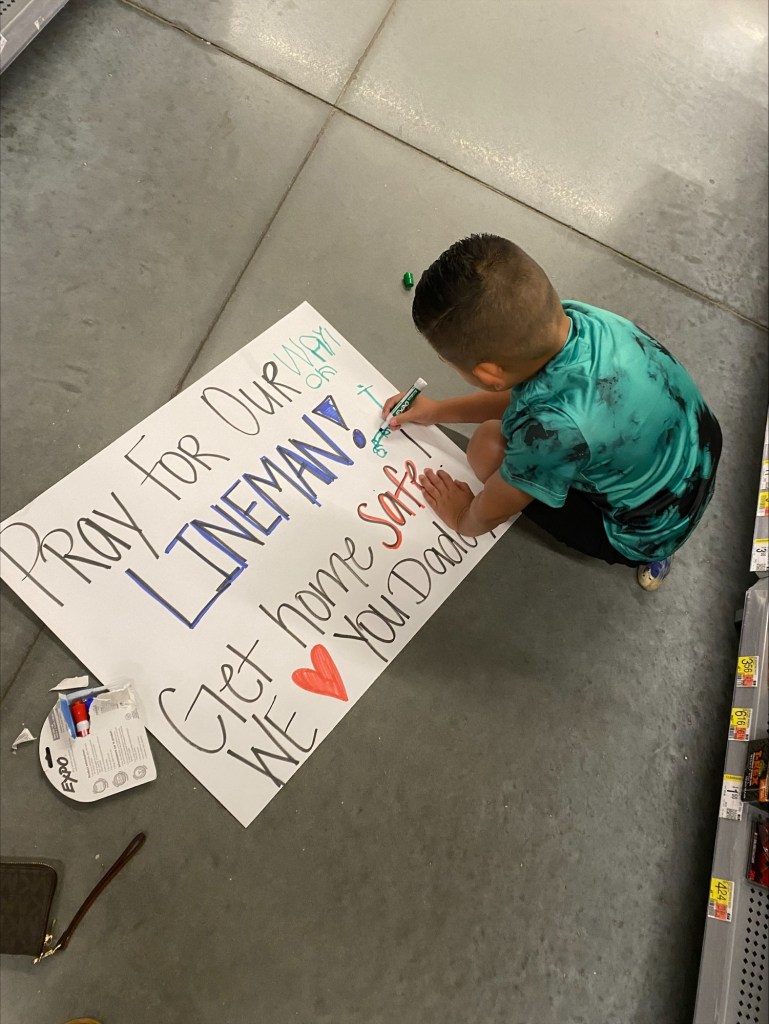 Labelle boy waves his dad who is a lineman off as he heads North. (credit; Heather Thomas)