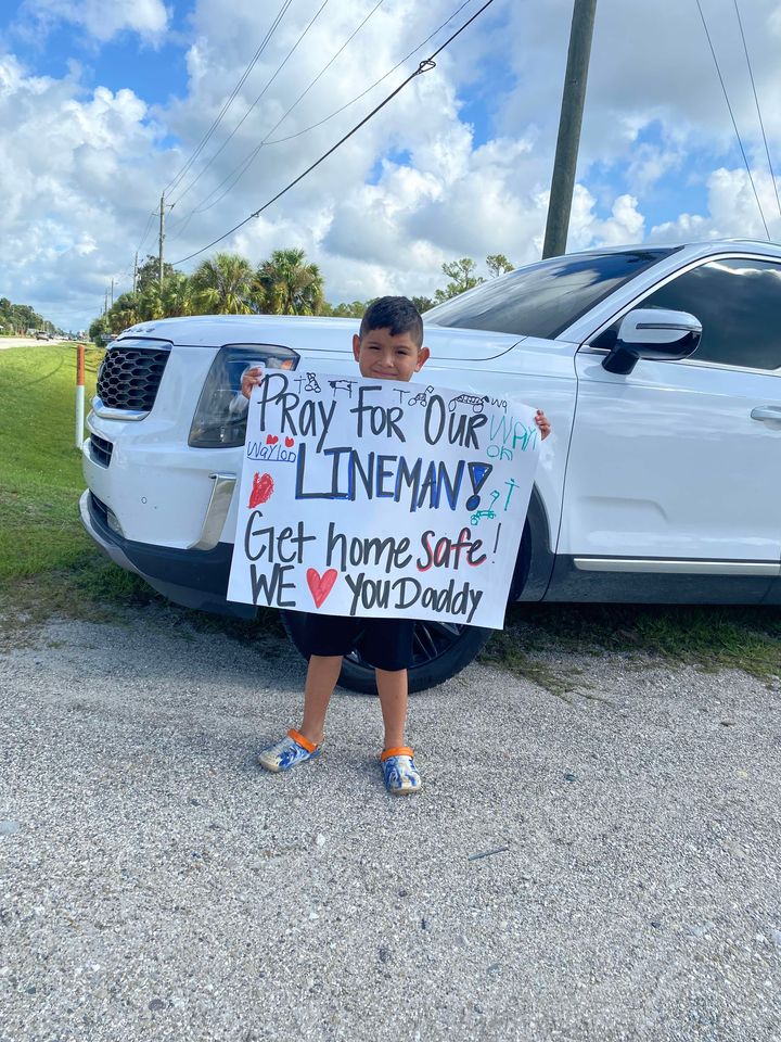 Labelle boy waves his dad who is a lineman off as he heads North. (credit; Heather Thomas)