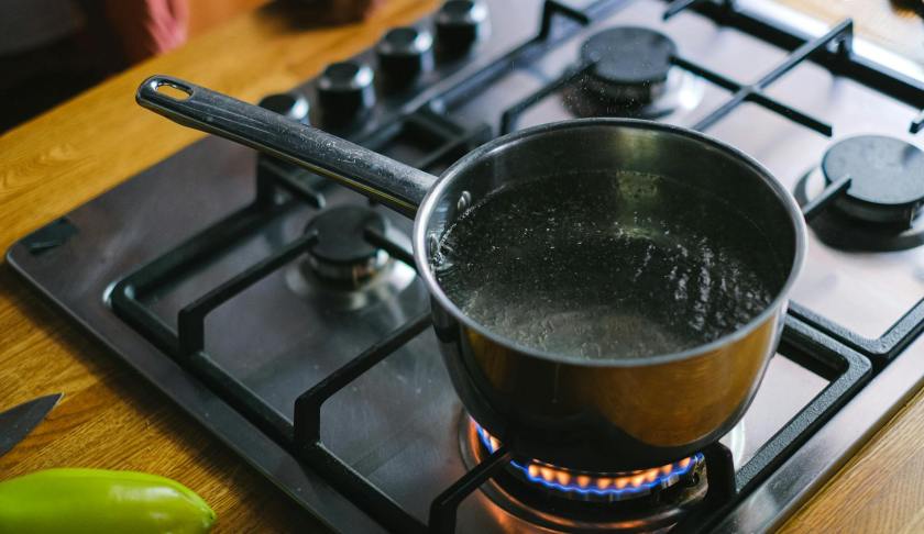 boiling water in pot on burner