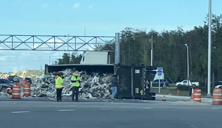 A dump truck overturned on Ortiz Avenue in Fort Myers. CREDIT: WINK News