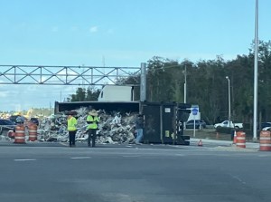 A dump truck overturned on Ortiz Avenue in Fort Myers. CREDIT: WINK News