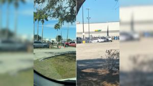 Police respond to a Walmart where a man pulled a gun during a confrontation. CREDIT: WINK News