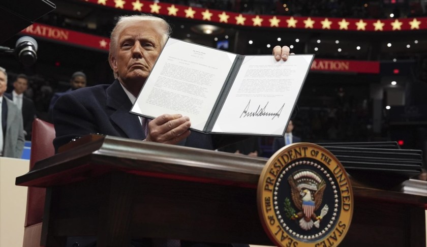 President Donald Trump signs executive order 2025. AP Photo by Evan Vucci.