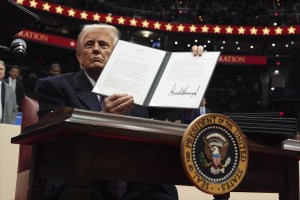 President Donald Trump signs executive order 2025. AP Photo by Evan Vucci.