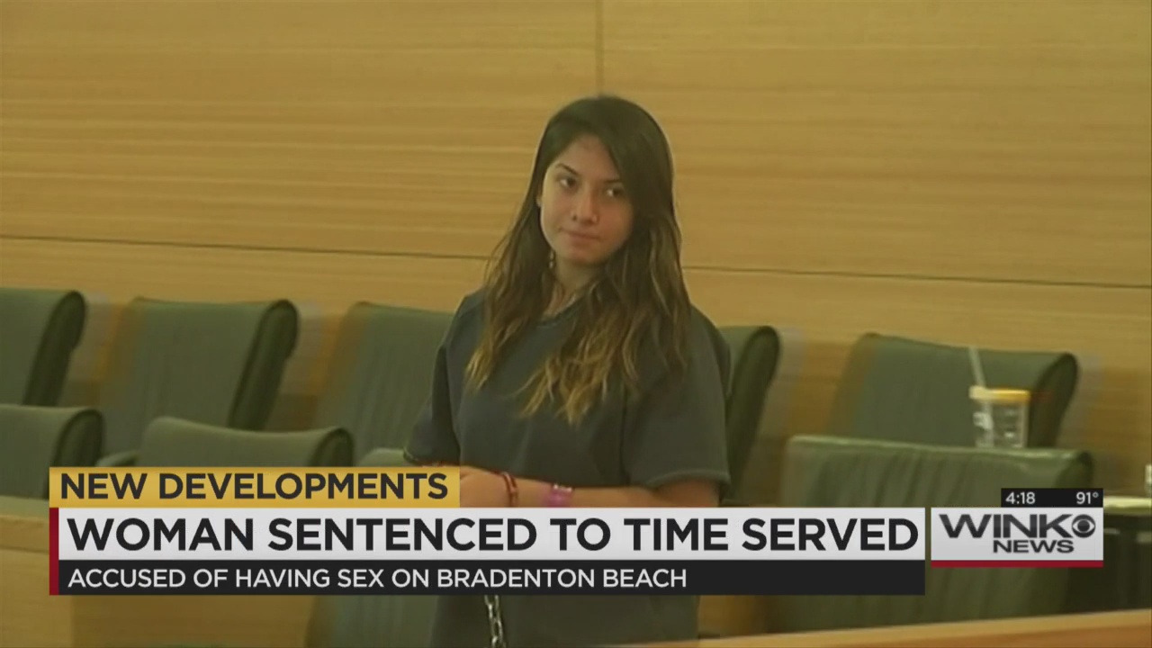 Woman convicted of sex on beach sentenced to time served pic